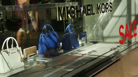 michael kors buys gucci|michael kors ownership.